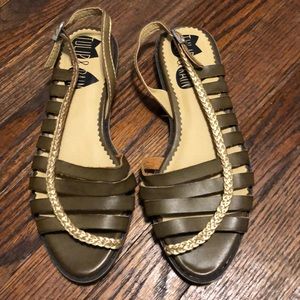 Olive green sandals with gold detailing